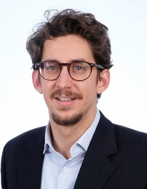 Dr. MARCO ROY